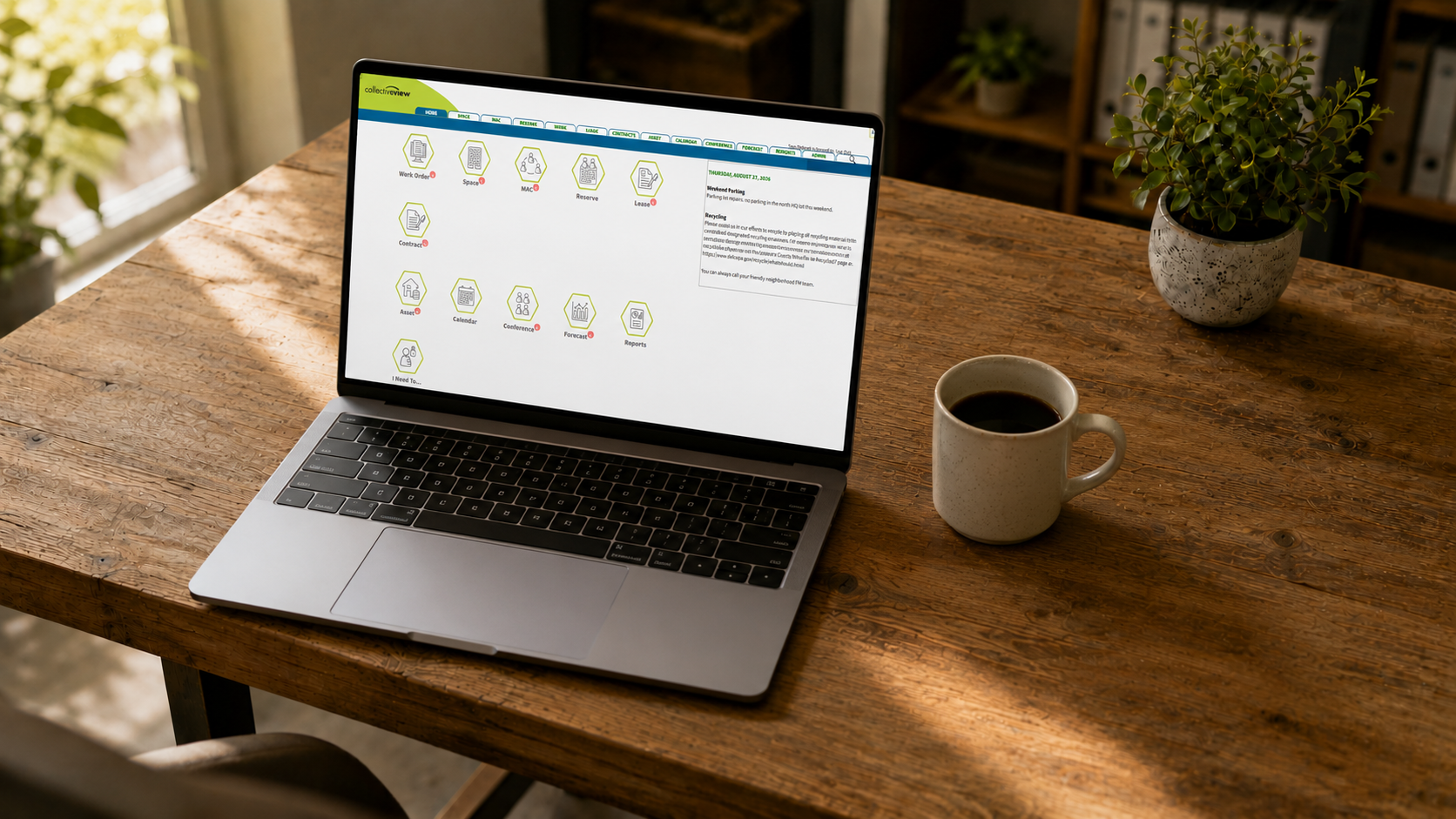 Laptop on a desk showing the Collectiveview dashboard